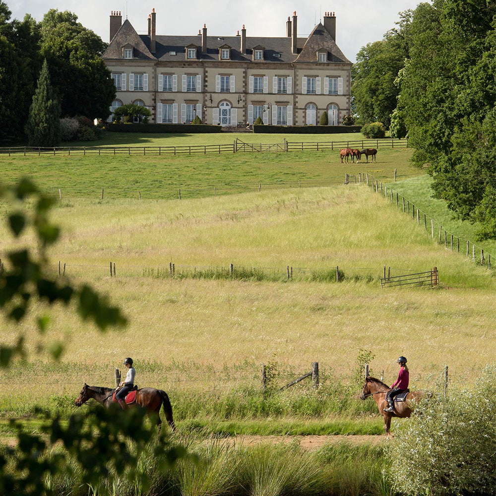 Promenade à cheval dans le parc du Château d'Ygrande